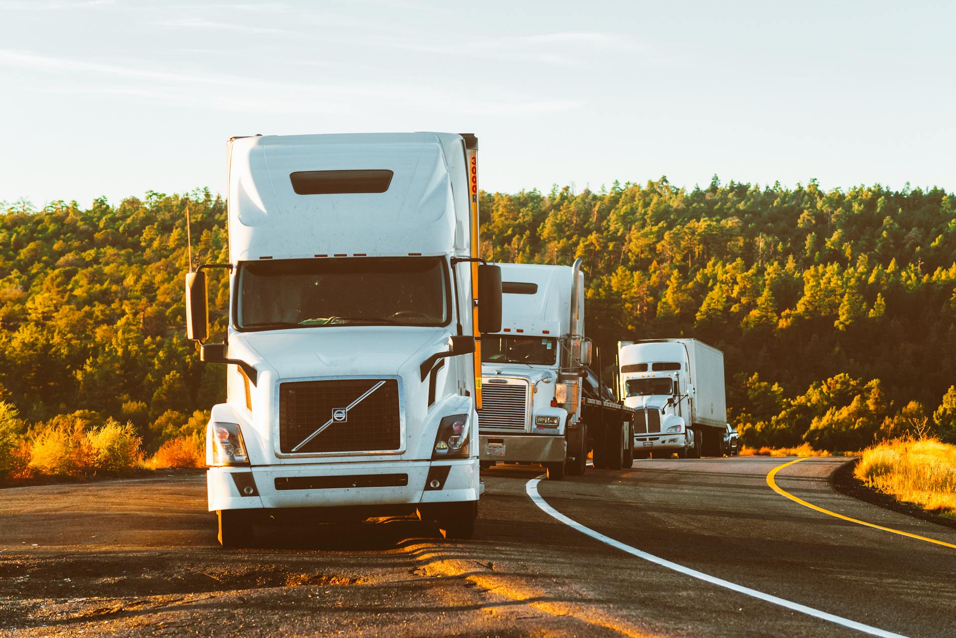 EVERMORE TRUCK LINES INC tractor and trailer on a regional lane